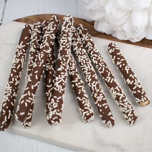Chocolate Pretzel Rods with White Sprinkles