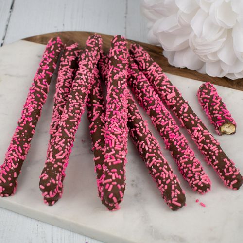 Chocolate Pretzel Rods with Pink Sprinkles